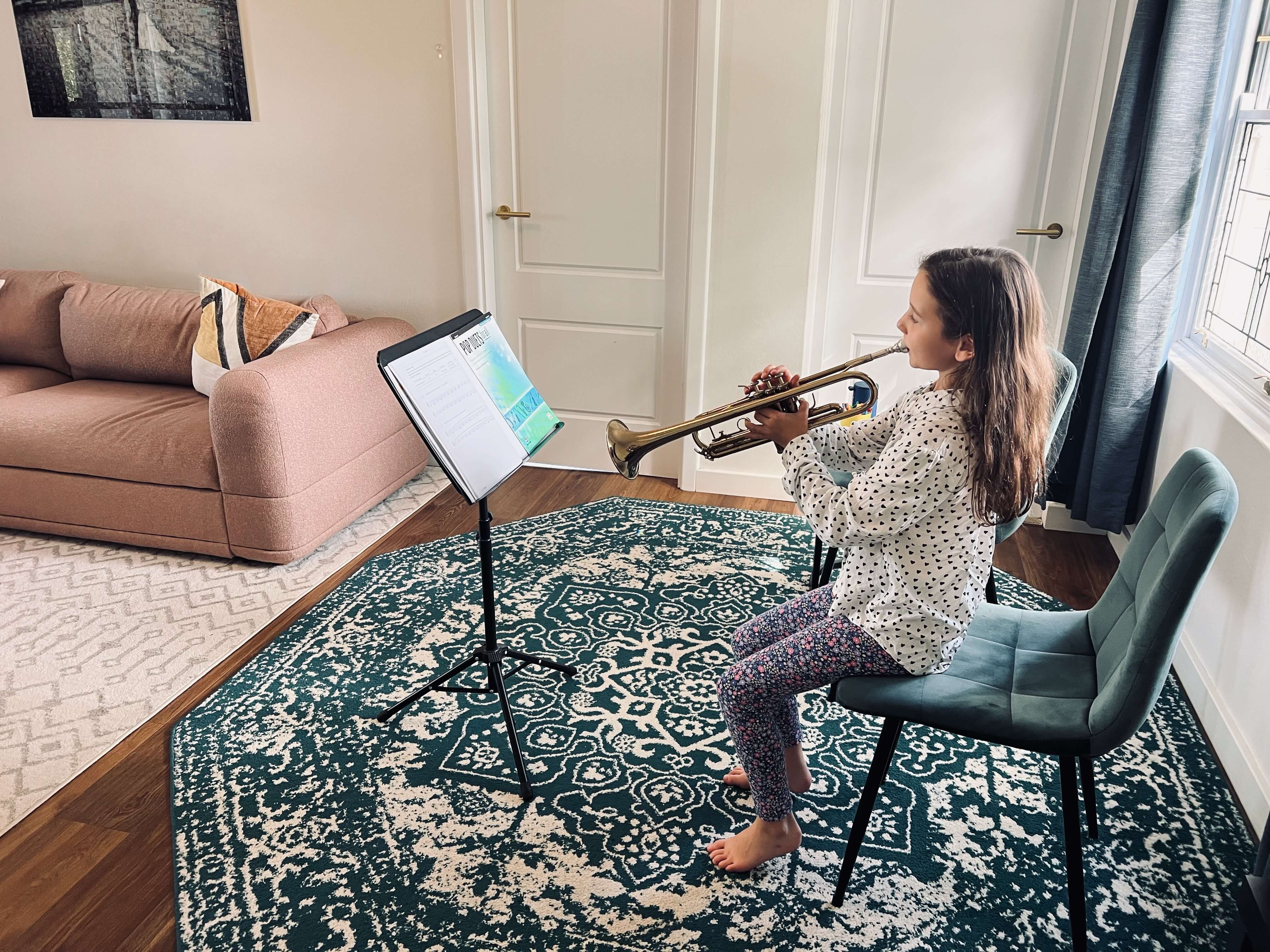 Student practising trumpet with Michelle